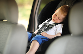 Bigstock Boy Sleeping In Child Car Seat 15796025