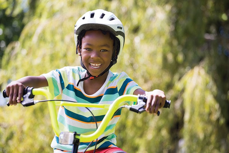 Teaching your child to ride a bike clearance without