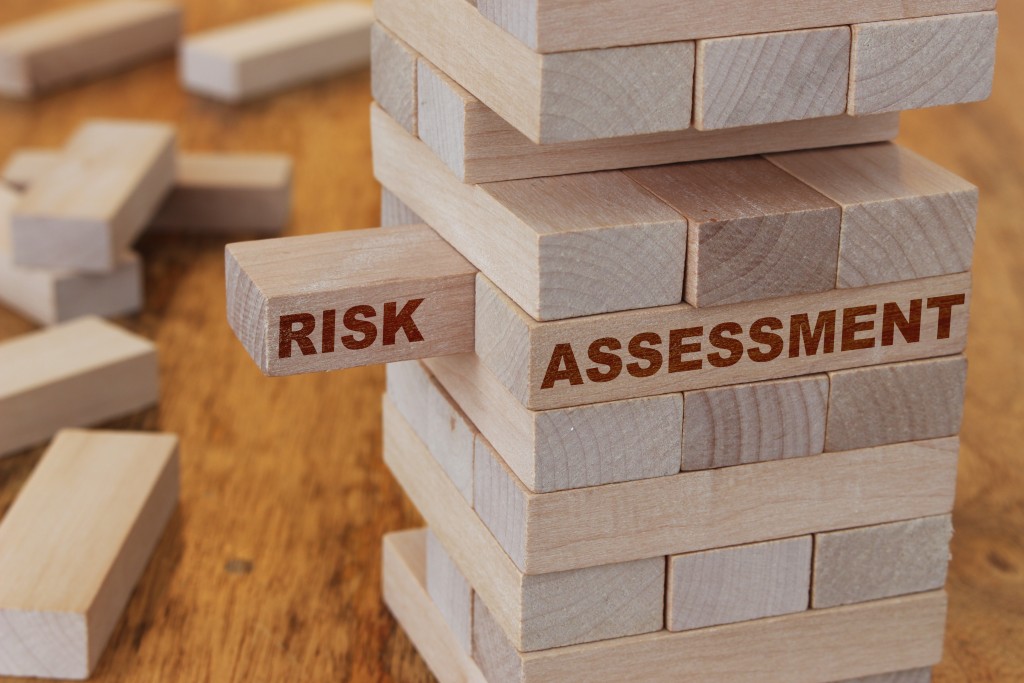 Risk,assessment,concept,using,wooden,blocks