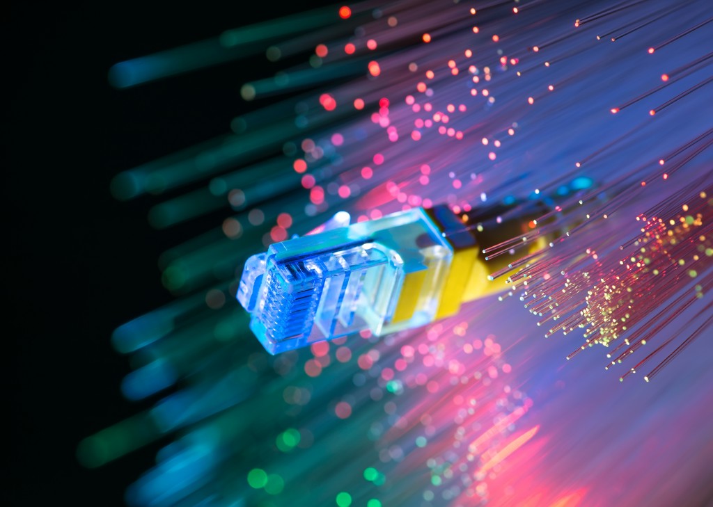 Network,cables,closeup,with,fiber,optical,background