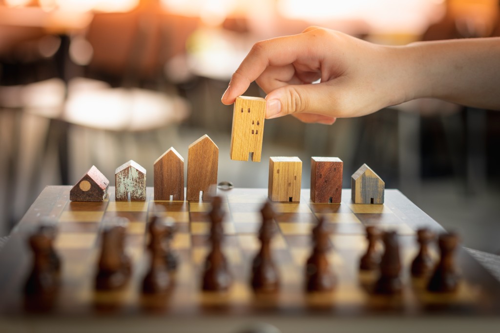 Building,and,house,models,in,chess,game,,business,financial,district