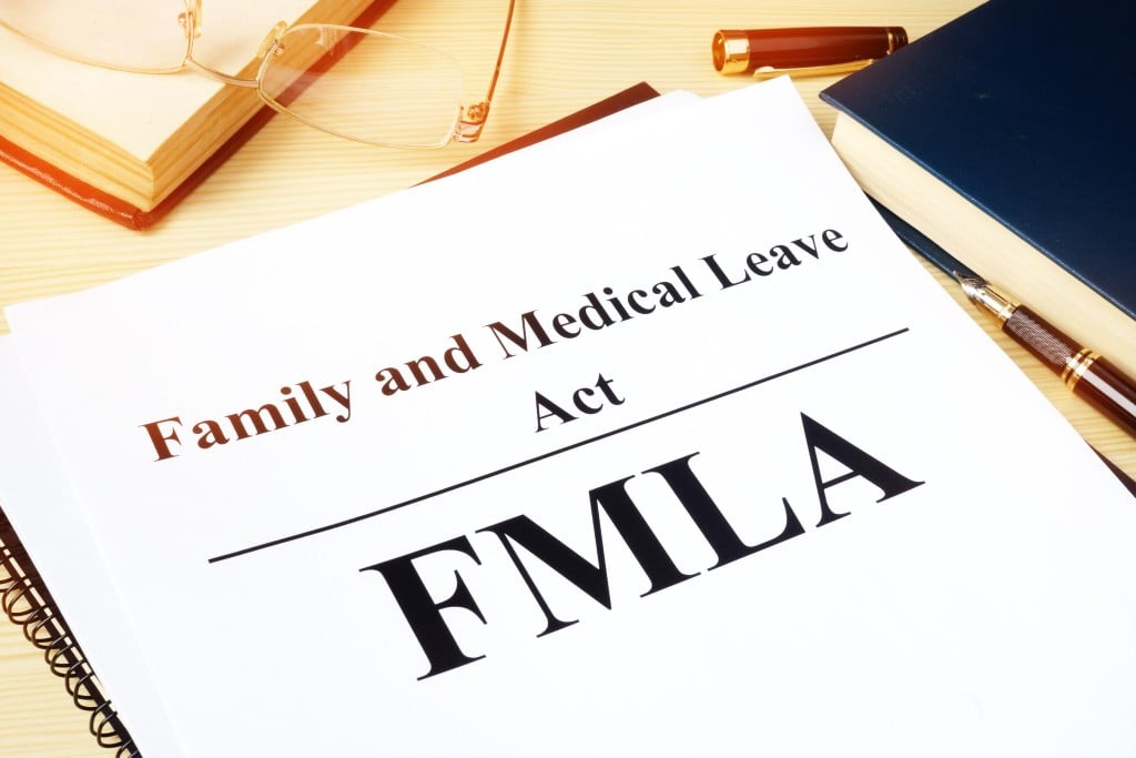 Fmla,family,and,medical,leave,act,on,a,desk.
