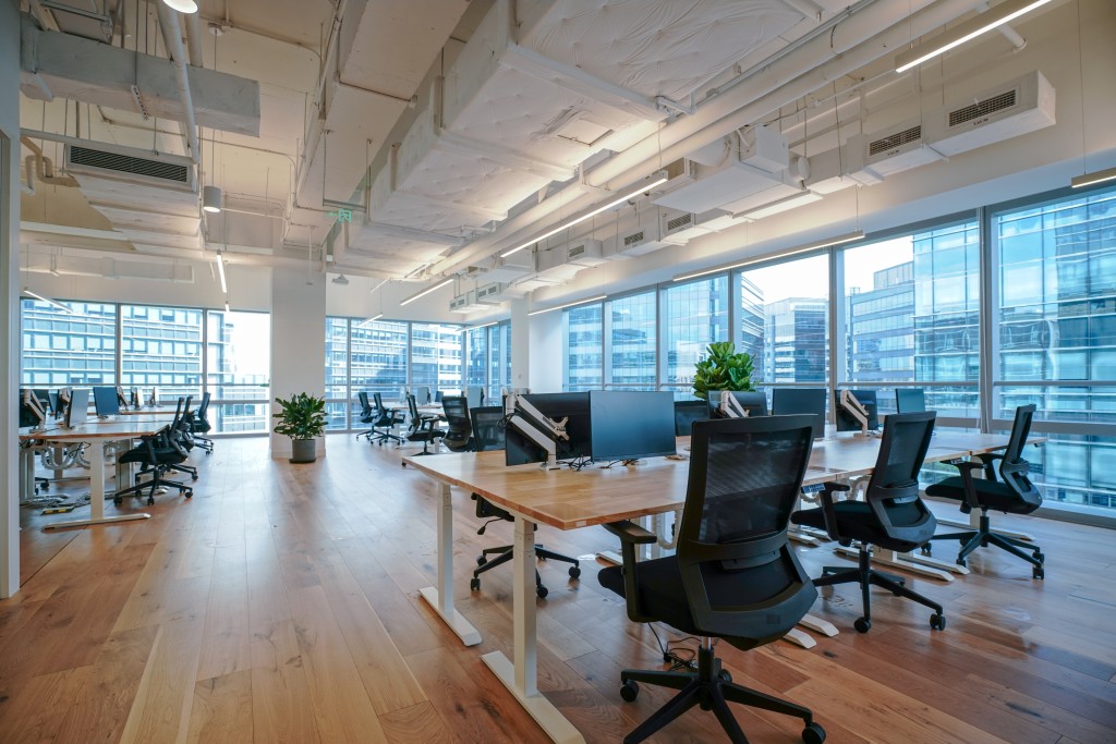 Interior,of,modern,empty,office,building.open,ceiling,design.