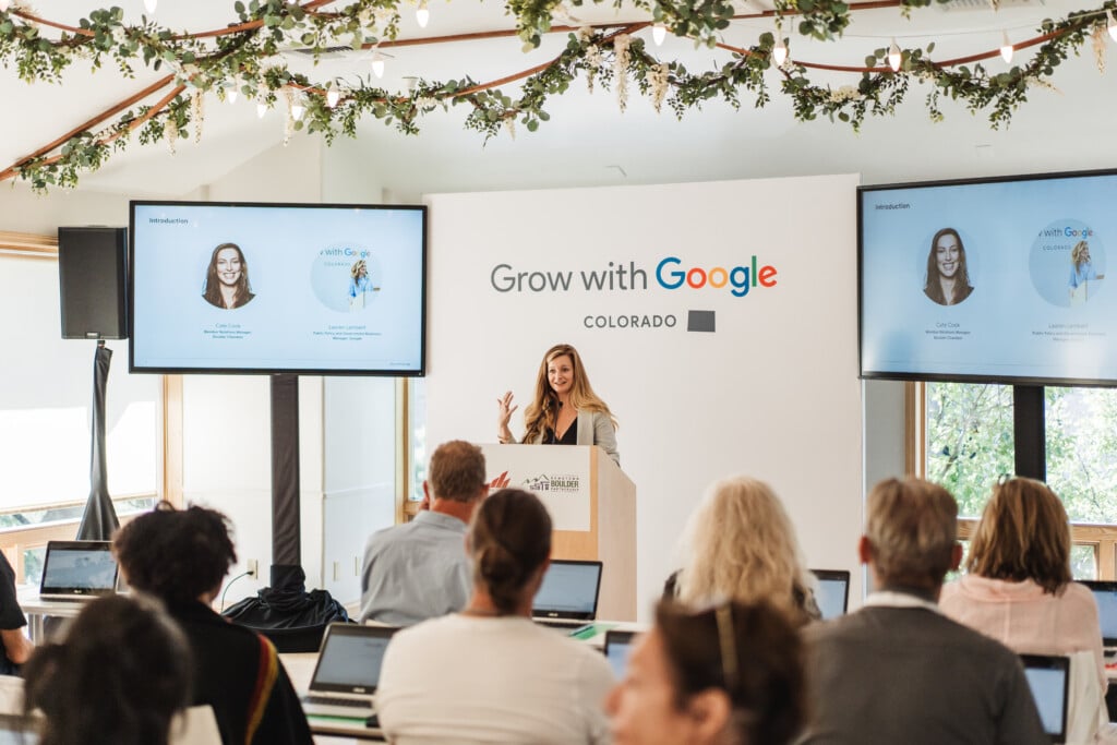 Grow with Google workshop: lady speaking on a podium