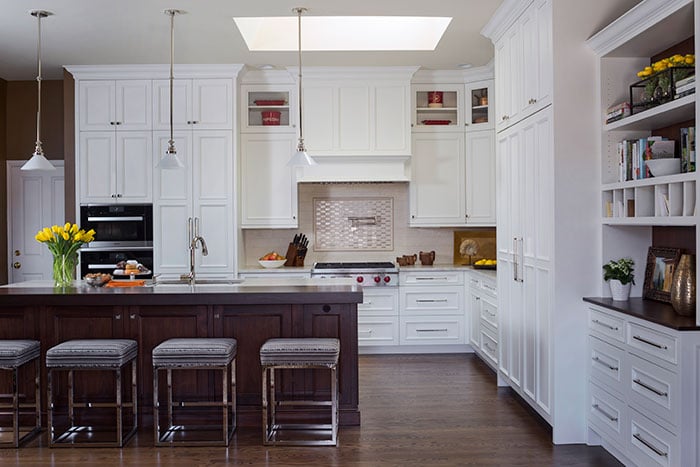 https://wpcdn.us-midwest-1.vip.tn-cloud.net/www.coloradohomesmag.com/content/uploads/data-import/9cebfdcf/Large-white-kitchen-with-island-A-Light-Filled-Kitchen-Remodel-Kitchen-Distributors-Colorado-Homes-and-Lifestyles-magazine.jpg