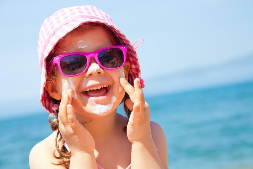 Sunglasses on the beach photography summer beach ocean clouds sunglasses