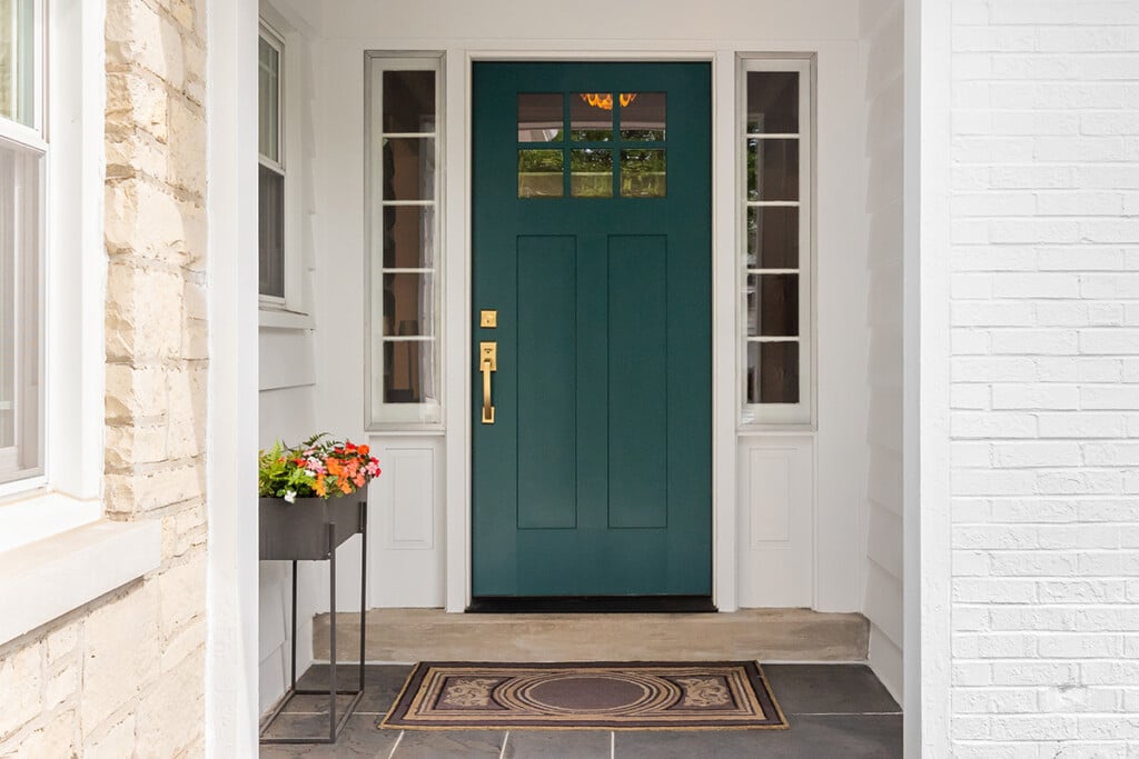 A Detail Of A Front Door On Home With Stone And White Brick Sidi