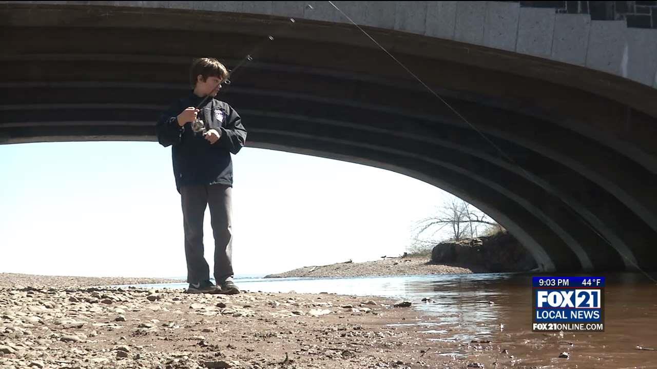 Father, Son Enjoy Some Fishing On Lester River