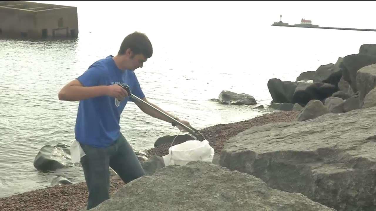 Volunteers Clean Up Canal Park Beach - Fox21Online