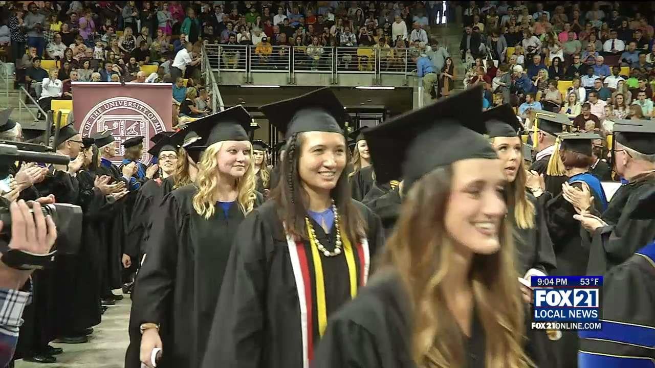 UMD Students walk across the stage for graduation