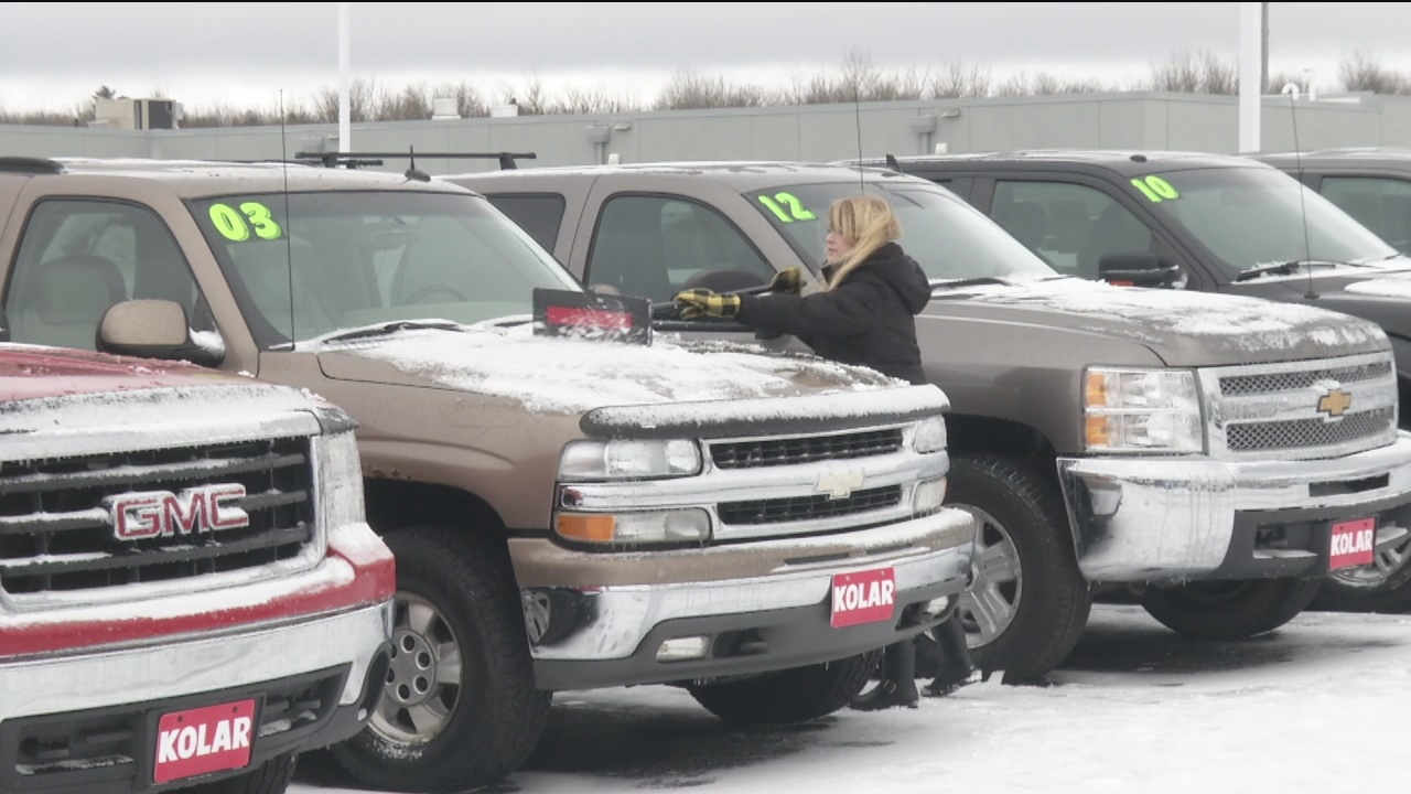 Snow Cleared from Vehicles at Hermantown Car Dealership