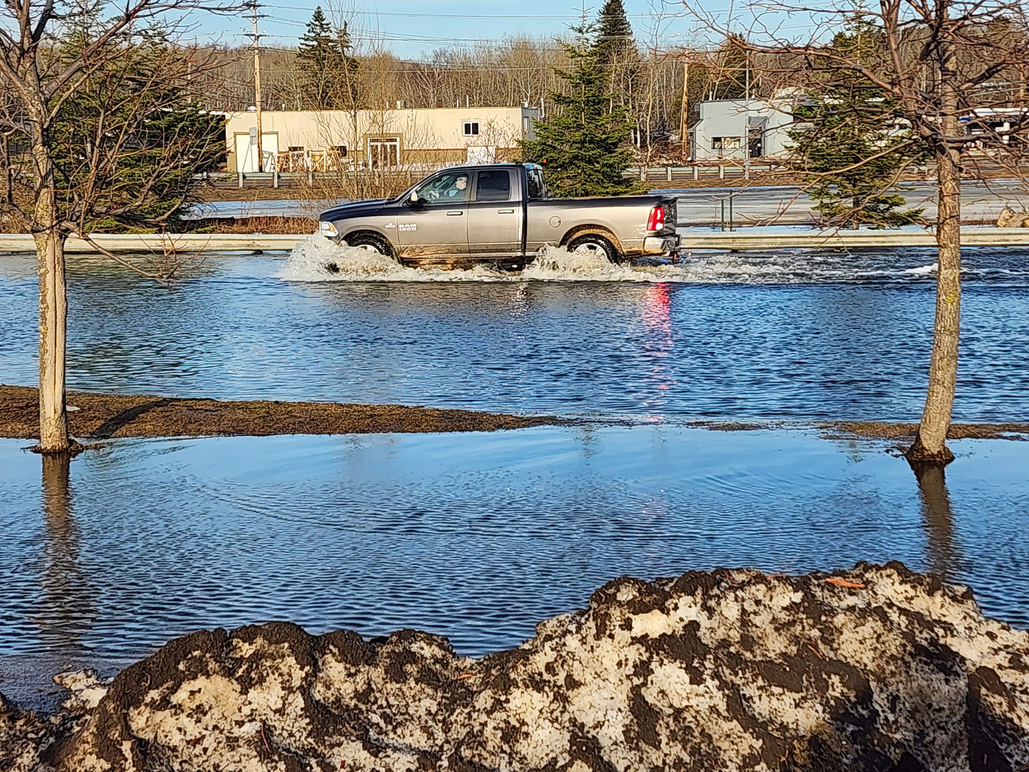 Flooding Shuts Down Busy Mall Drive & Maple Grove Road Intersection