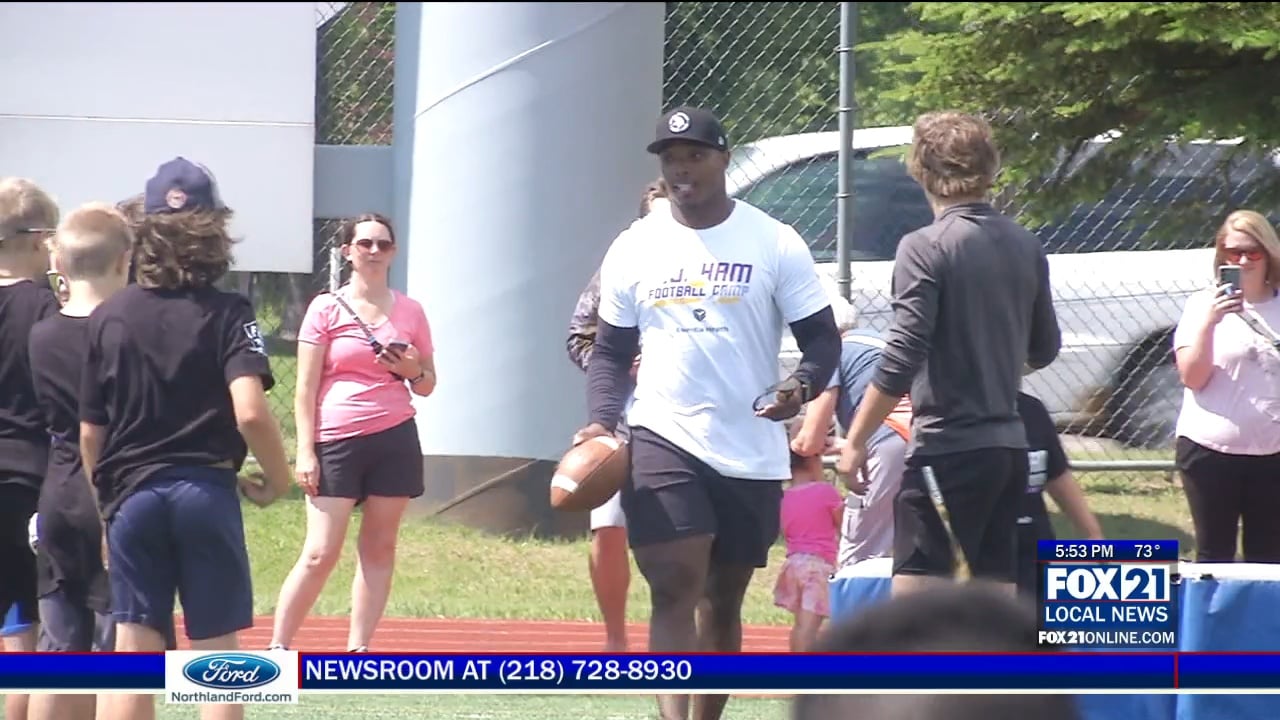 Photos and video: C.J. Ham returns to Denfeld for youth football camp -  Duluth News Tribune