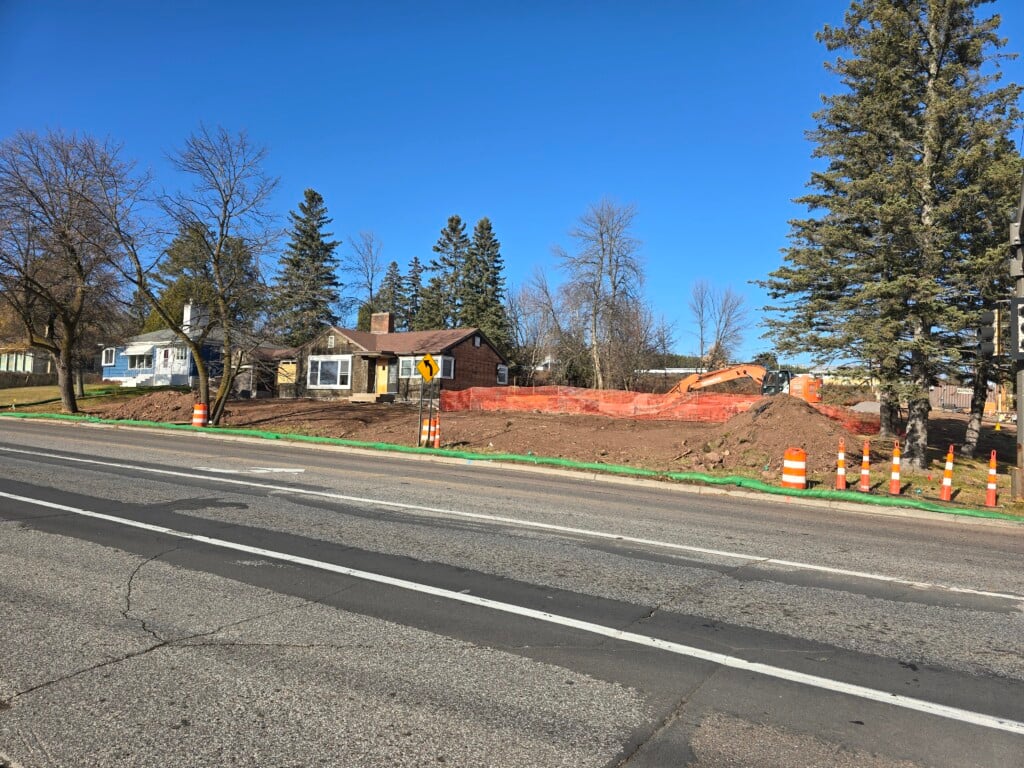 Home demolition at corner of N. 40th Ave E & London Road for future roundabout