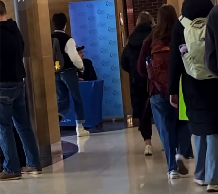 Screen shot of Turning Point USA Bottle Throwing Incident from Yik Yak