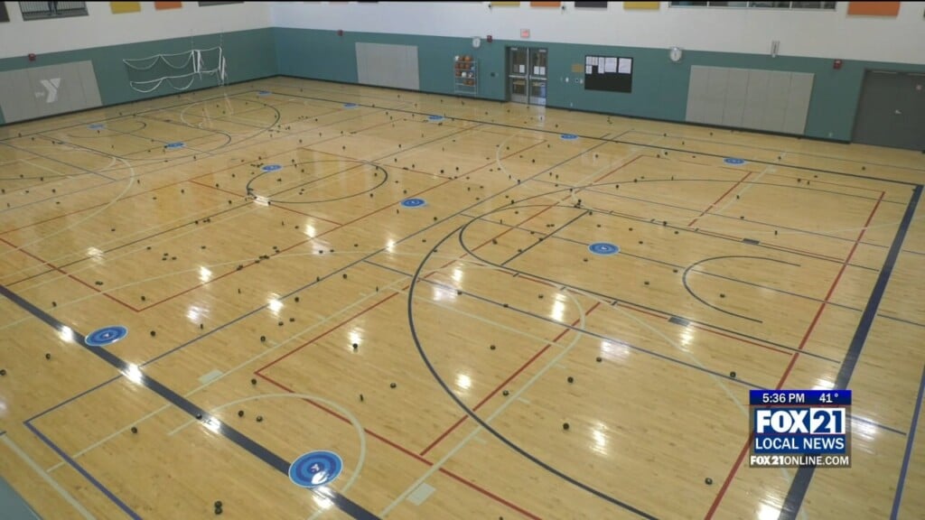 Community Tries Their Luck At The Ymca "chuck A Puck" Event