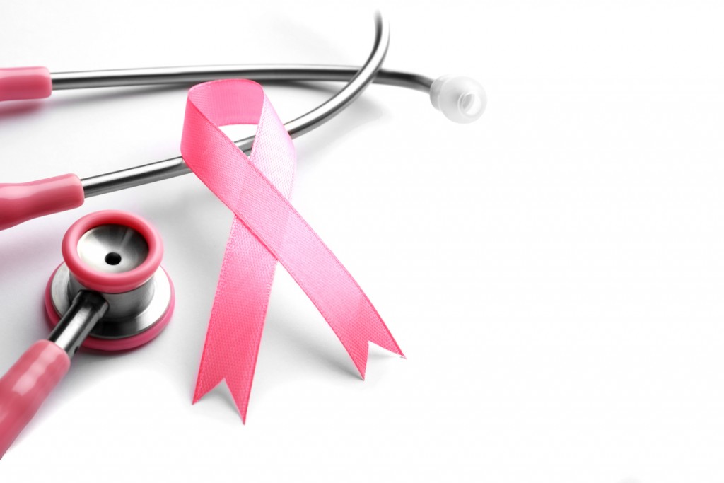 Pink Ribbon And Stethoscope On White Background, Space For Text. Breast Cancer Concept