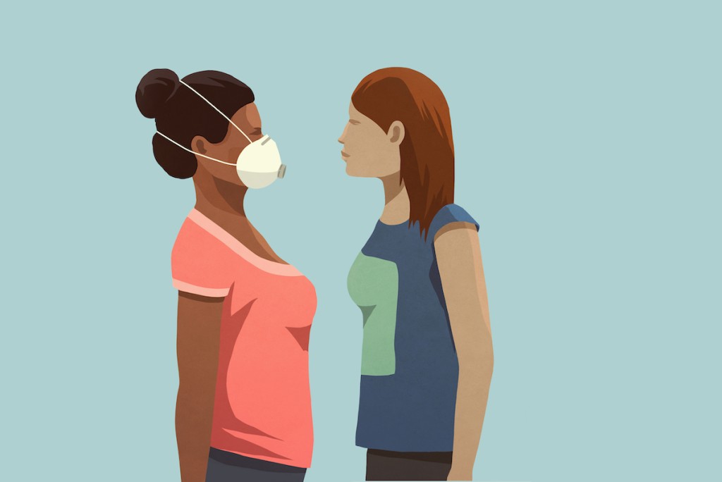 Aggressive Woman Confronting Woman In Face Mask