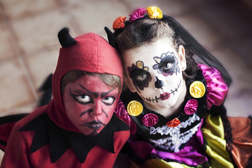 Boy And Girl In Halloween Fancy Dress Costumes