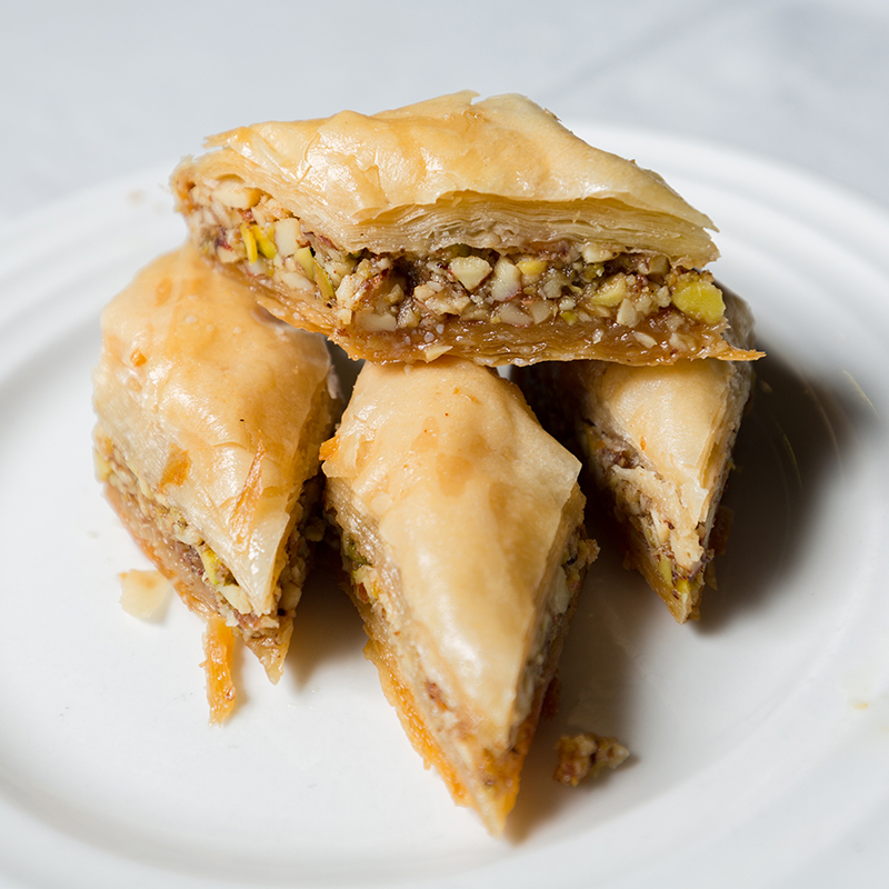 Close Up Of Baklava, A Dessert Made With Filo Pastry And Chopped Nuts And Sugar Syrup.it Is A Popular Turkish Dessert