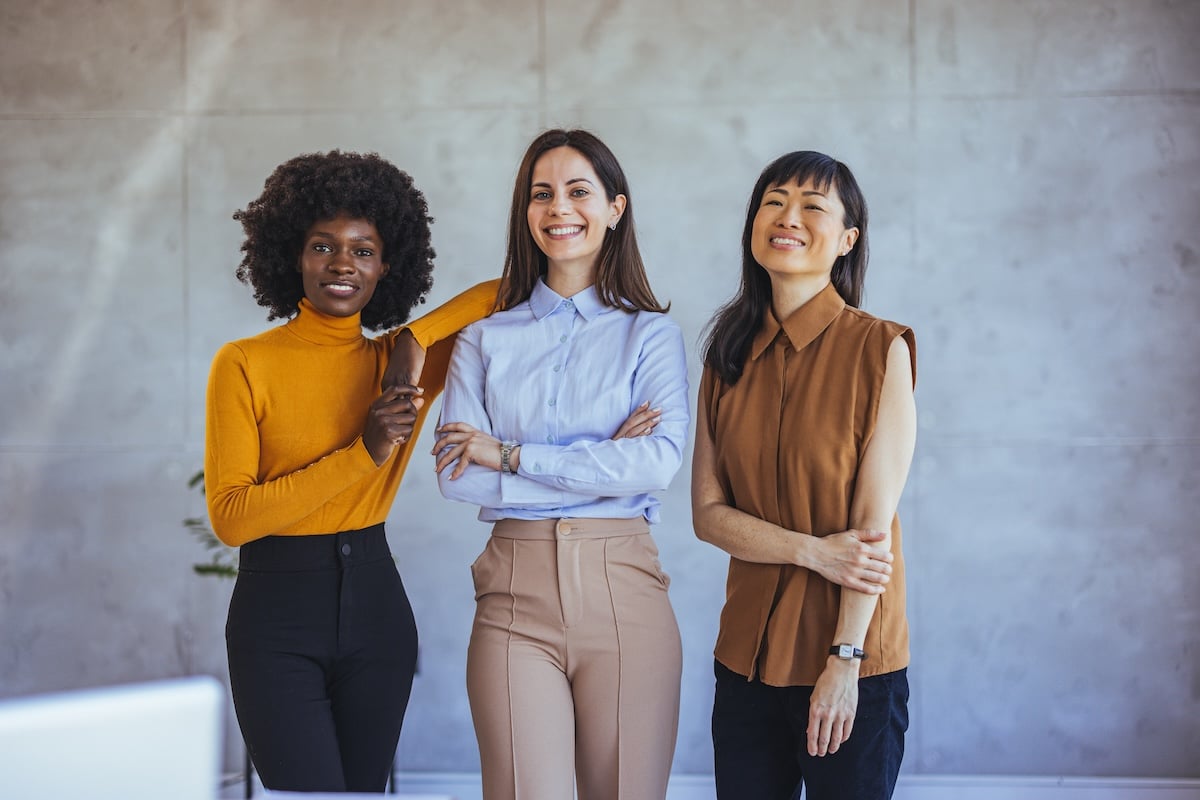 0-women-to-watch-monmouth-main Confident Diverse Women In Professional Attire Smiling Together