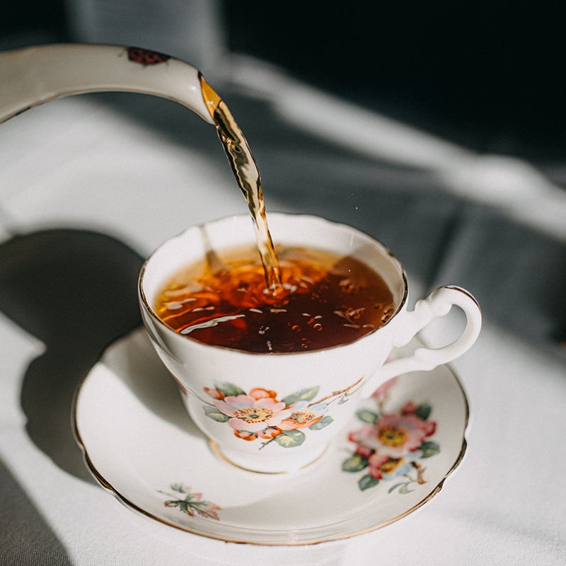 Vintage China Pouring Tea In Tea Pot