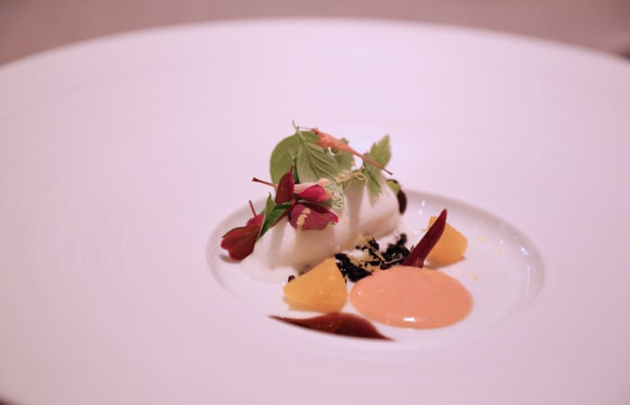 Next is a surprise course from the flora tasting. The sweet and tart flavors of blood orange are mellowed by milk, black olive and citrus herbs. The flavors are bright and refreshing; I can see why some opt for the flora menu.