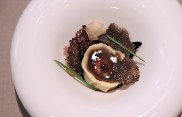 No $500 dinner is complete without truffles. These black truffles are shaved over a nice raviolo with a savory jus poured all over. The bite is fleeting but memorable. Is this a throwback to the "black truffle explosion" dish at Trio? I don't know, but I can see the striking similarities in flavor and presentation.