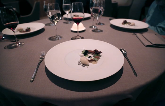 By this time, I'm very full. The second to the last dessert is a silky chocolate crescent with exotic finger lime caviar. A little tart and very sweet, it's time to start winding the meal down.