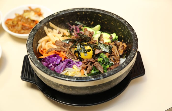 My number one dish at Korean restaurants is dol sot bi bim bap. The dish ($14.95) is served in a steaming stone pot that delightfully crisps the rice as you mix it with a flavorful kochujang. I love that it's full of  flavor, crunch, heat and refreshing crisp veggies.