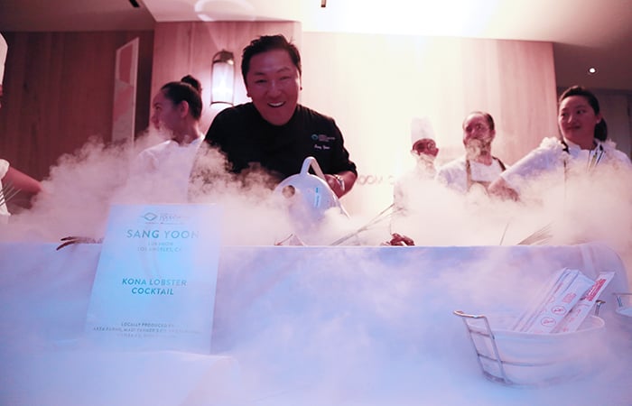 Chef Sang Yoon of  Lukshon Restaurant in LA "smokes out" his display. 