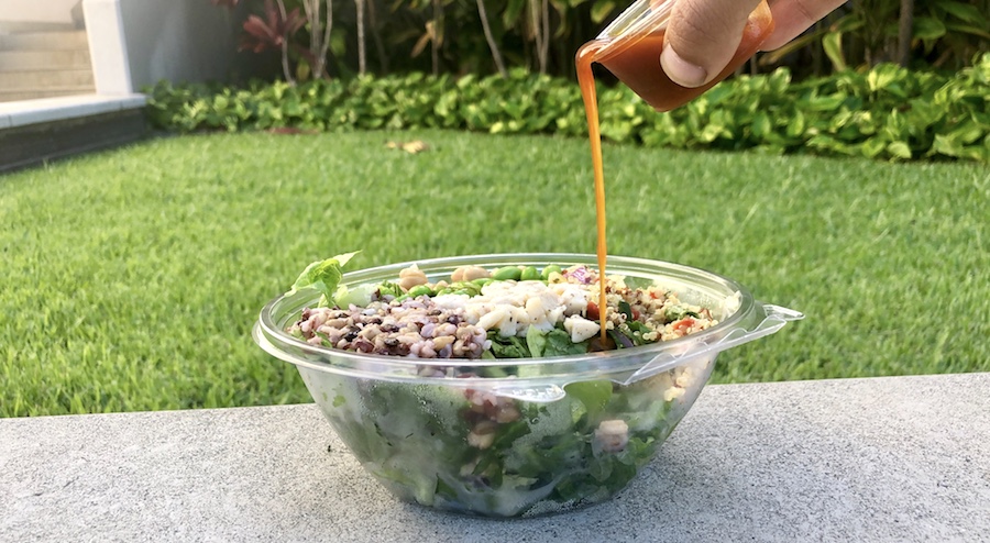 lean proteins on a bed of greens