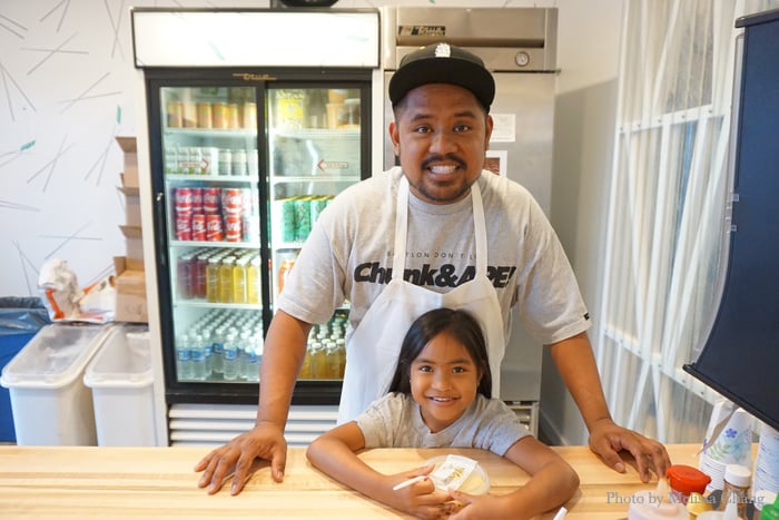 Sheldon with daughter Peyton at the counter.