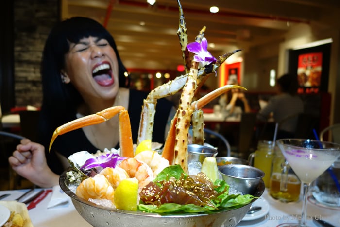 Biancha getting excited at Crackin' Kitchen's seafood platter.
