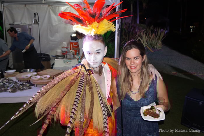 Perfomer's from Maui's Ulalena show wandered throughout the event to entertain guests. This one is shown here with Hawaii magazine editor Christine Hitt.