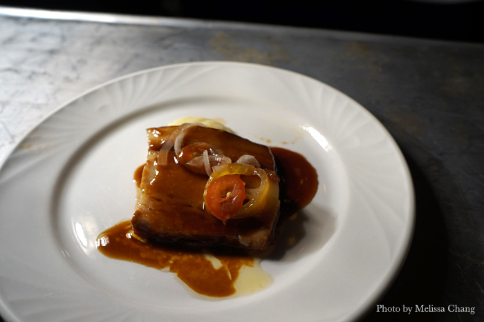 Adobo braised pork belly with mung bean puree and Ho Farms tomato relish.