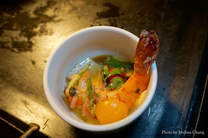 Chef Jason Watanabe's twice-cooked Shinsato Farm pork with Kauai shrimp and mung bean broth.
