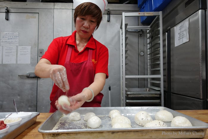 Ah Ngan making her balls of mochi dough at Chinatown Express.