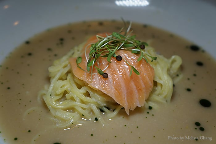 Off-menu ramen with lobster broth topped with salmon belly and basil oil.