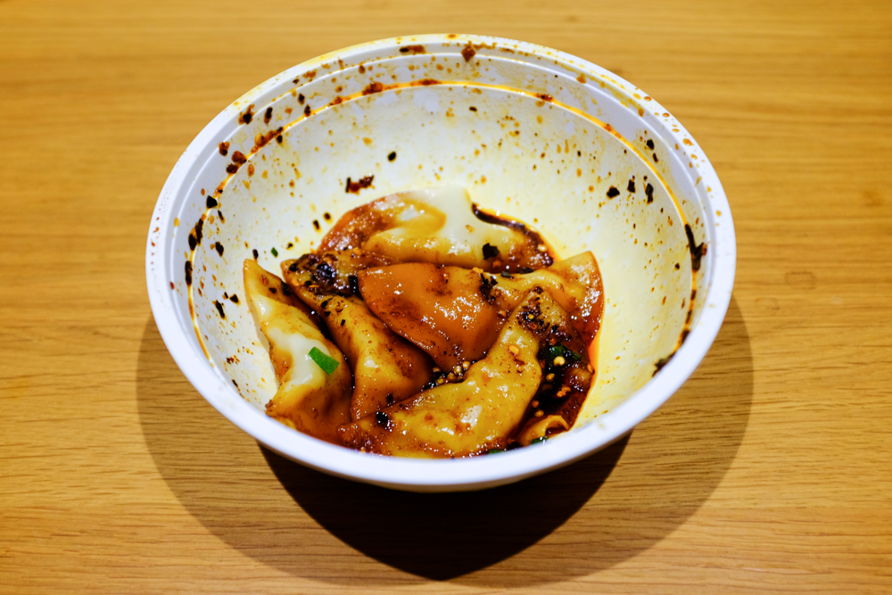 We eat with our eyes first, but don't let this impression turn you away. The spicy oil dumplings (5 for $5 NZD / $3.50 USD) Eden Noodles are SUPER GOOD. 