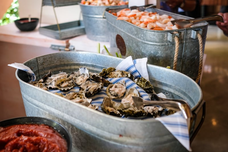 Build your own seafood tower with fresh shucked oysters, crab knuckles, peeled shrimp and lobster parfait.