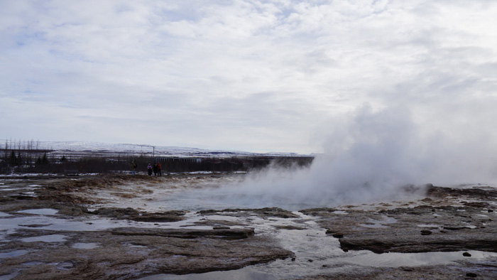 Steam billowing from one of the hot springs in Geysir.