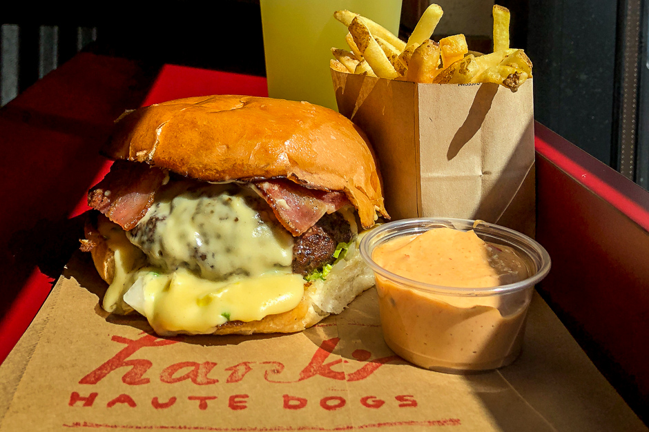 Hankburger with truffle cheese sauce and bacon with fries and pineapple ice
