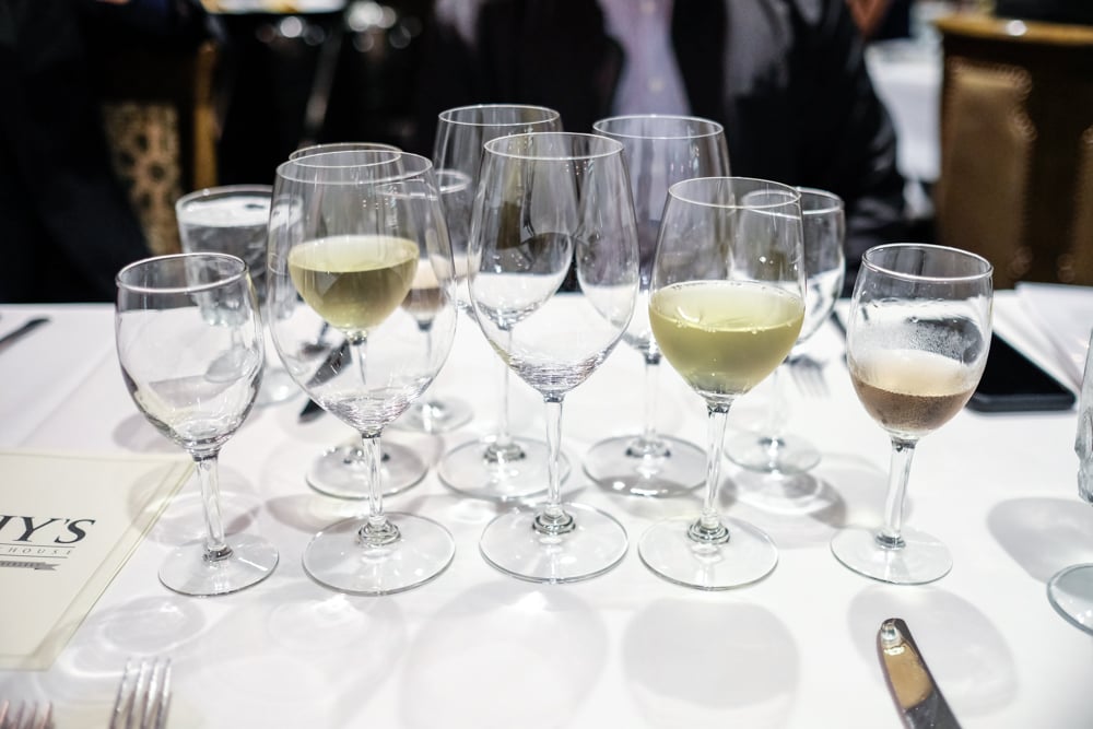 The collection of glasses in front of you may seem daunting, but you'll come to appreciate the sommelier selected wine pairings in no time. 