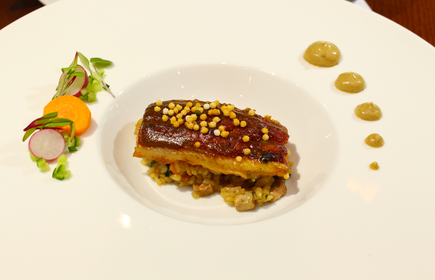 Kabayaki unagi on foie gras fried rice. Photo by Grant Shindo.