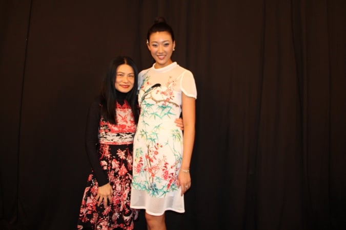 Vivienne Tam and Karen Hu, Miss China 2014 backstage before the show.