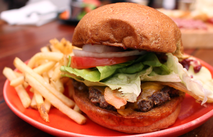 The venison burger ($14) is made of Molokai venison, pork fat, blackberry and raspberry mustard and cheese on a whole wheat bun. The potato or ulu fries are cooked up in your choice of rice bran oil or pig fat.