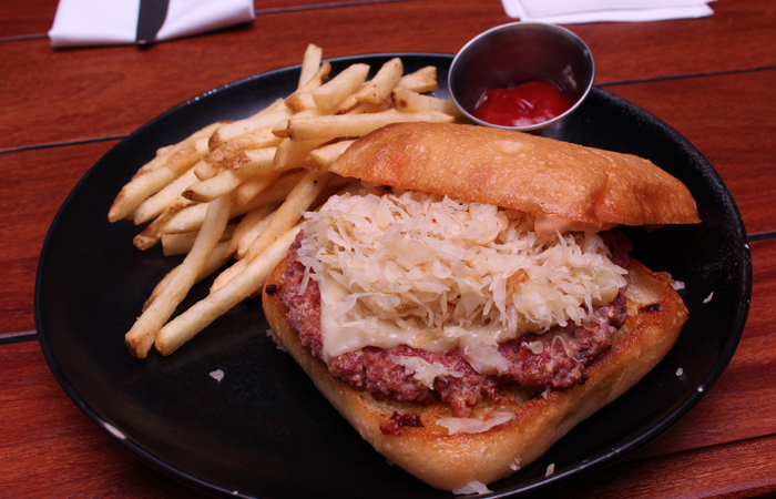 We got to try the off-menu Reuben burger that chef Noah Blair is working on for St. Patrick's Day. The tangy sauerkraut, thousand island dressing and corned beef — all spot on. Although not on menus yes, they are hoping to get it on the menu asap.