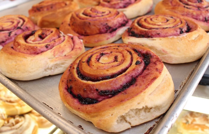 These cinnamon rolls are about the size of a wall clock and five iPhones thick. 