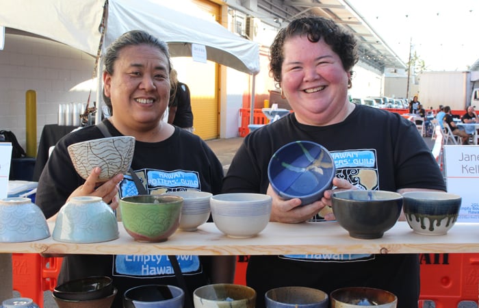 Fuki Ikeuchi and Janet Kelly showing off their bowls. 